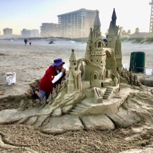 andy Hancock and scott dodson, both sandcastle building masters work on a 5 ton sandcastle build over 8 hours on south padre island