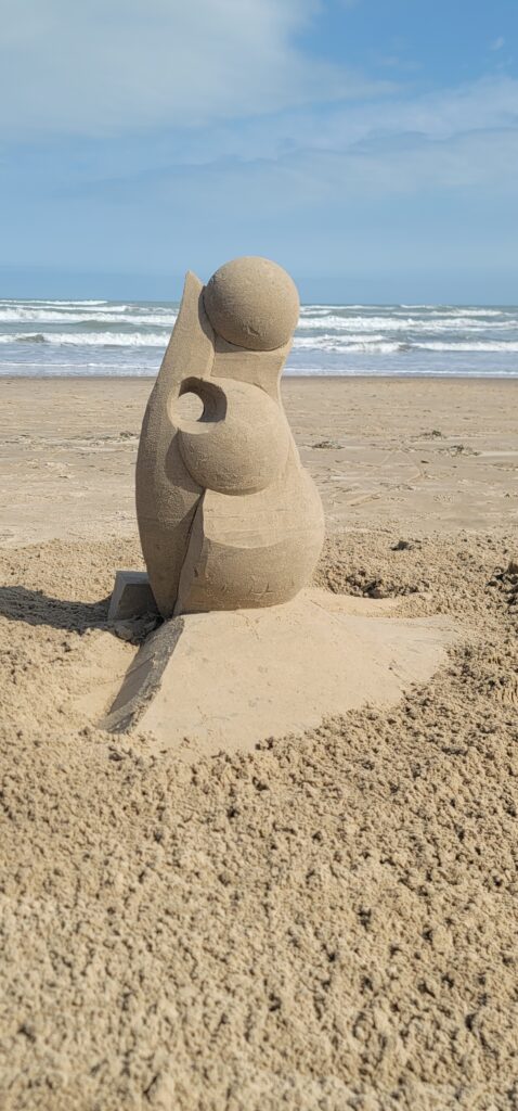 abstract sculpture in sand on south padre island